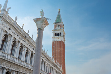 Fototapeta na wymiar St Mark's Campanile and Column in Piazza San Marco