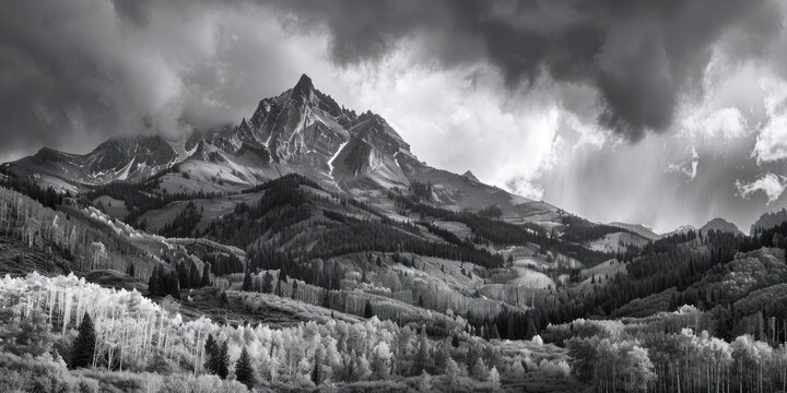 A stunning black and white photograph of a mountain range. Perfect for travel or nature themed projects.
