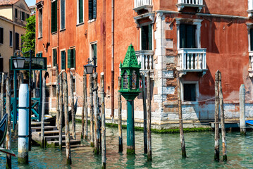 Venetian Waterfront with Moorings and Historical Architecture