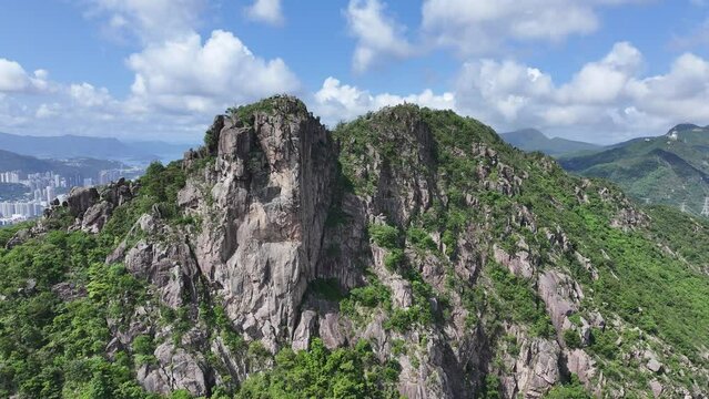 Lion Rock in Kowloon Peninsula with stunning views and hiking trails,symbolizes the perseverance and fighting spirit of the Hong Kong people and a symbol of  progress and overcoming difficulties