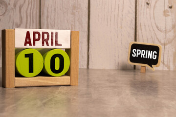 April 10 calendar date text on wooden blocks