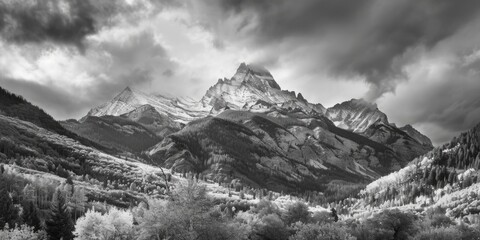 A stunning black and white photo of a majestic mountain range. Perfect for travel blogs or nature...