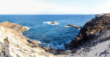 Fototapeta na wymiar rocky coast in the area of Charco de Palo