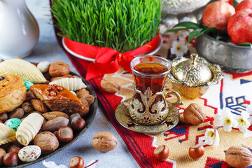 Traditional Azerbaijan holiday Novruz background with green semeni,traditional azerbaijan...