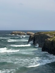 Atlantic Ocean waves crashing on cliffs near Ribadeo, Galicia, Spain, February 2023