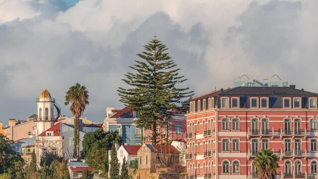 Jardim do Torel timelapse, a traditional garden and viewpoint with unusual views to the city center of Lisbon during evening. Cloudy sky. It has a terrace, a bar and a large pond. Portugal