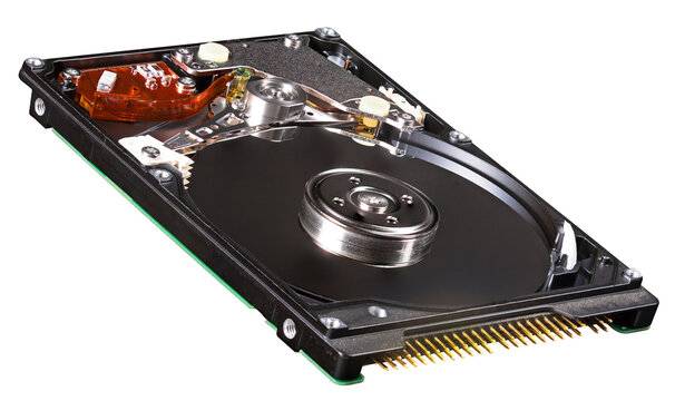 Small hard drive used in old laptops on isolated background.