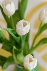 Close-up of a bunch bouquet of beautiful white tulips indoors. - 756002929