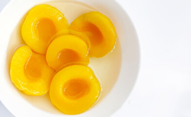 Peach halves in syrup. Fruity desserts
