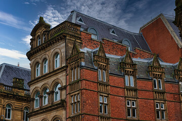 Fototapeta premium Victorian architecture with ornate details and blue sky in Leeds, UK.