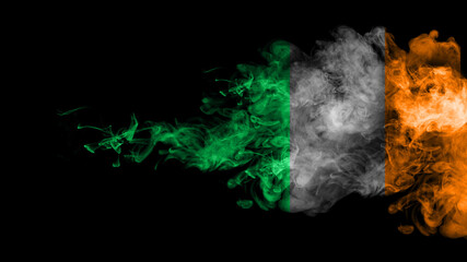 Cloud of smoke in colors of Irish flag on black background