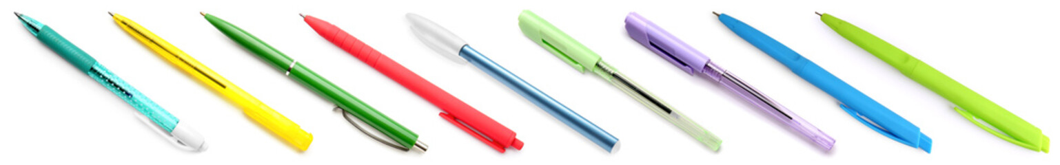 Collection of ball point pens on white background
