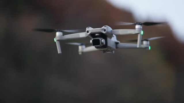 Drone hovering at sureveillance intelegence mission in slow motion