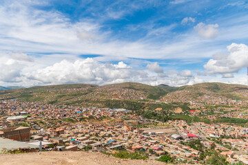 houses built on a hill, hillside settlements, urban development in latin america
