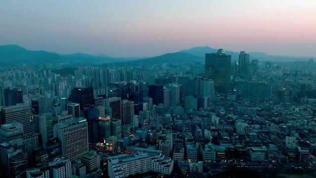 Drone View of Seoul city in South Korea, Gangnam road 60fps, winter, suset