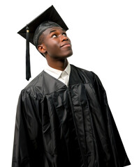 Happy graduate looking up isolated on a transparent background