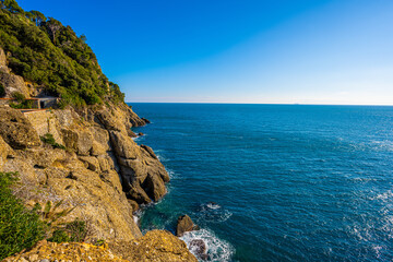 Rugged Cliffs and Endless Blue: The Mediterranean Coastline near Portofino, Italy