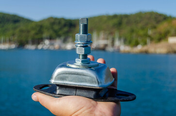 A new marine engine mount for a sailing yacht on the marina background.