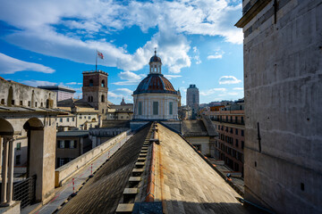Fototapeta na wymiar Aerial View of the Historic Rooftops and San Lorenzo Cathedral Dome in Genoa, Italy