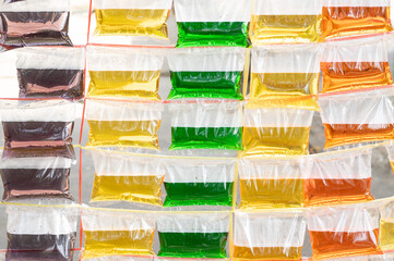 colorful water in plastic bags background.Colorful backdrop for photo.