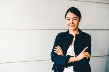 Portrait of happy young Asian businesswoman. Business success concept. uds