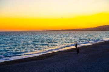 Sunset Stroll on the Promenade des Anglais, Nice, France - obrazy, fototapety, plakaty