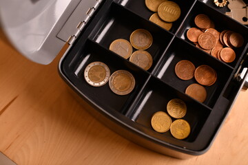 German money coins in an iron portable safe	