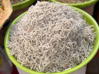 anchovy in tray display in traditional market, ikan teri