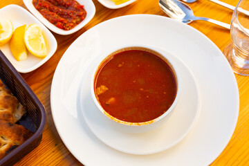 Classic Turkish Okra stew Bamya with beef and okra, tomatoes, onion, garlic and lemon juice