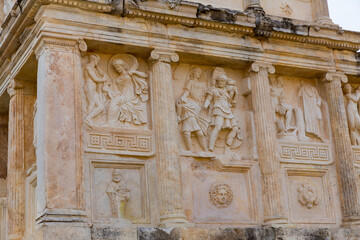 Closeup of figured marble reliefs of antique temple Sebasteion with mythological, allegorical and imperial subjects in ancient city of Aphrodisias, Turkey