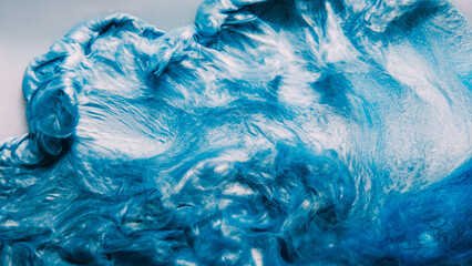 Ink water splash paint flow blue shiny fluid drop