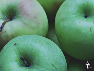 A close up of granny smith apples.