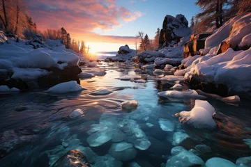 Cercles muraux Coucher de soleil sur la plage A river of liquid water surrounded by snow and ice under the sunset sky