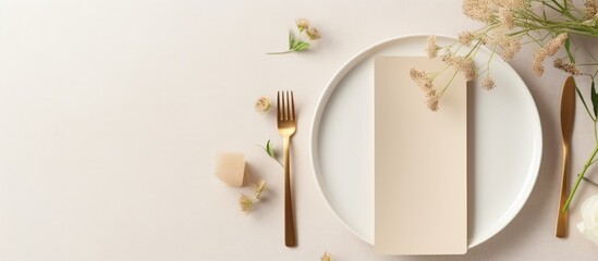 Menu card mockup on modern minimal table setting with neutral beige color top view. Space for text. Sheet card template for a wedding invitation in Scandinavian style.