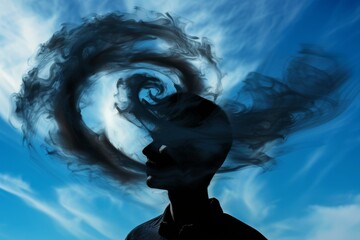 Man silhouette head a swirling black cloud dreams manifesting blue sky