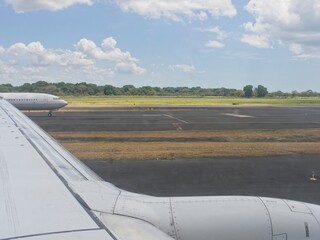 Picture from an airplane on the runway, waiting to take off