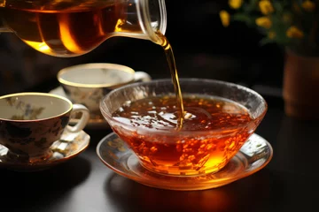 Zelfklevend Fotobehang steaming hot tea © nan
