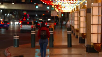 Young woman walking through Downtown Las Vegas - travel photography