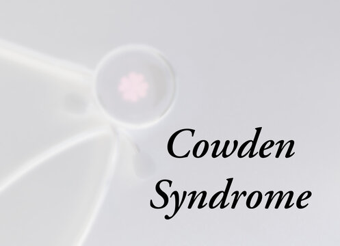 Medical term Cowden Syndrome with stethoscope background.