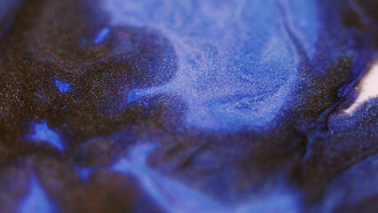 Glitter paint splash. Ink mix. Defocused blue brown color shiny shimmering texture emulsion gloss...
