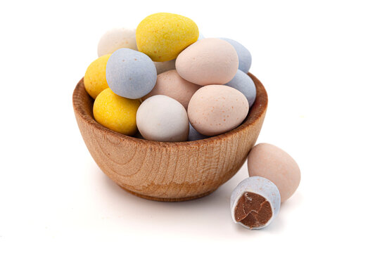 Mini Multicolored Candy Coated Chocolate Easter Eggs Isolated on a White Background