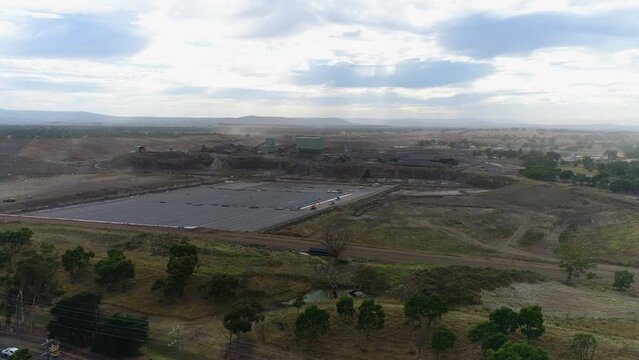 Lateral drone pan over mine site