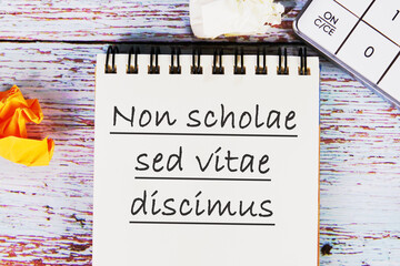 Non scholae sed vitae discimus It is translated from Latin as We study not for school, but for...