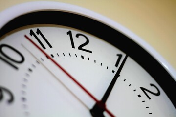 Fototapeta na wymiar Close-up View of Wall Clock: Detailed Timepiece Shot