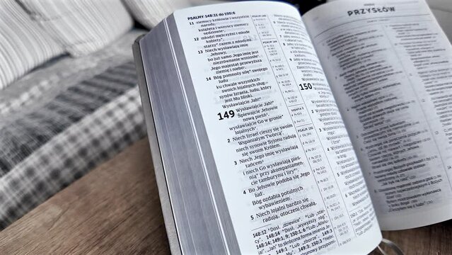 Close Up Of An Old Holy Bible. Men Read Holy Bible.