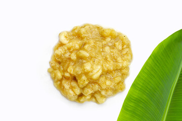 Mashed banana on white background.