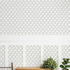 Wooden cabinet by a white and gray semicircle patterned wall