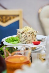 Salad of meat tongue and cucumber. Festive table