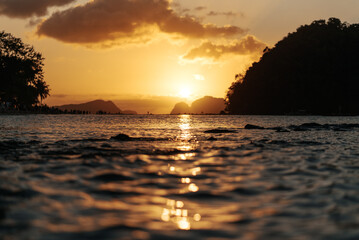 Fototapeta na wymiar sunset over the beach in the Philippines