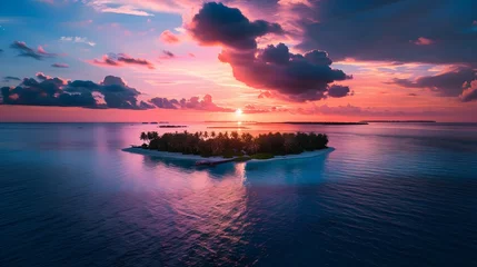 Fototapete Sonnenuntergang am Strand Aerial view of a beautiful paradise island in the Maldives, Indian Ocean, during a colorful sunset